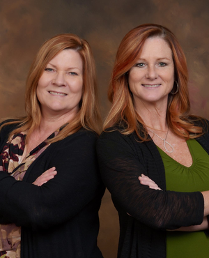 Portrait photo of Lisa and Linda Team
